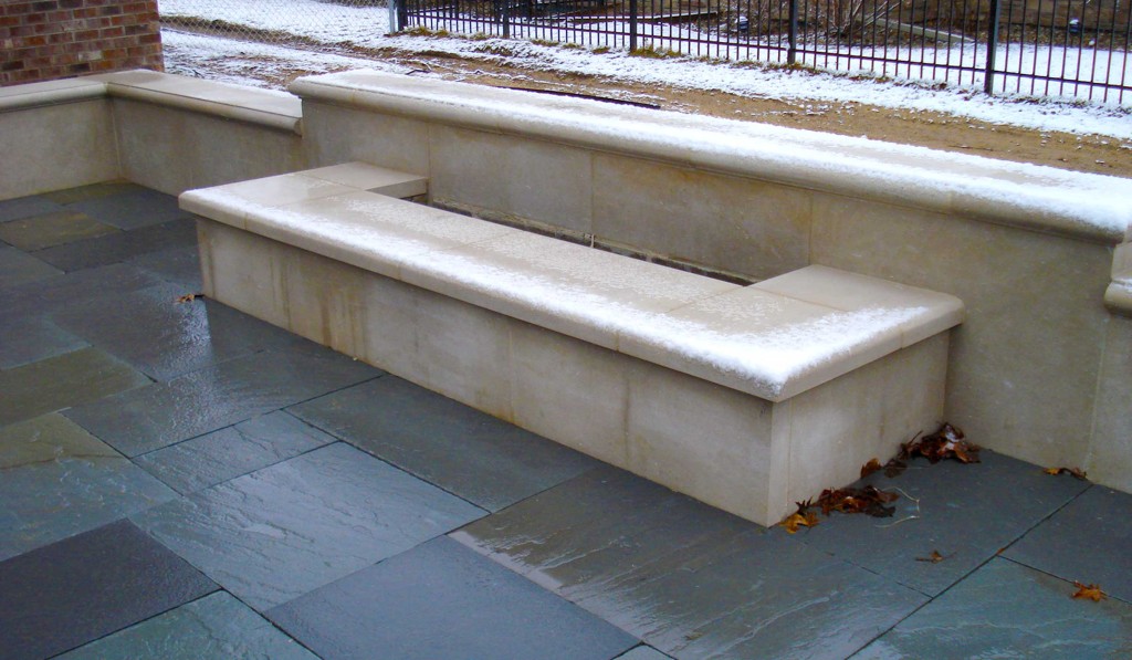 Indiana limestone fire trough with bull nosed Indiana limestone coping